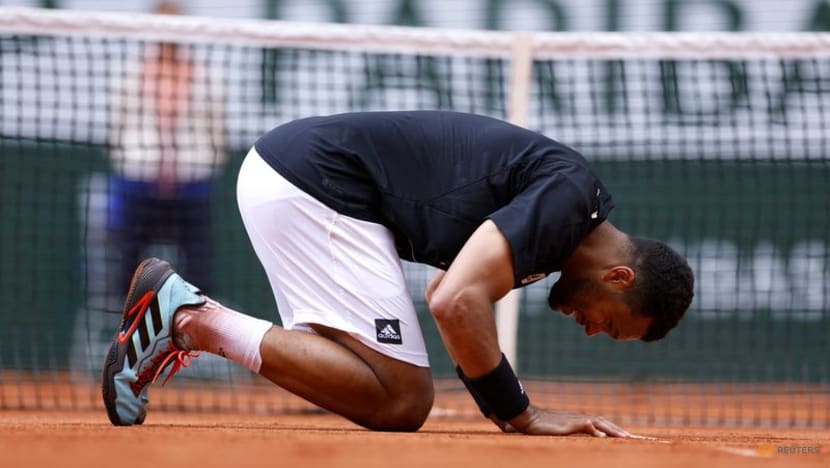 Tears flow as Tsonga retires after French Open defeat Tears flow as Tsonga retires after French Open defeat