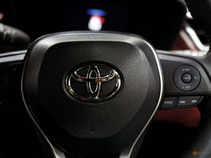 FILE PHOTO: The Toyota emblem is seen on the steering wheel of a vehicle during the media day of the 41st Bangkok International Motor Show after the Thai government eased measures to prevent the spread of the coronavirus disease (COVID-19) in Bangkok, Thailand July 14, 2020. REUTERS/Jorge Silva