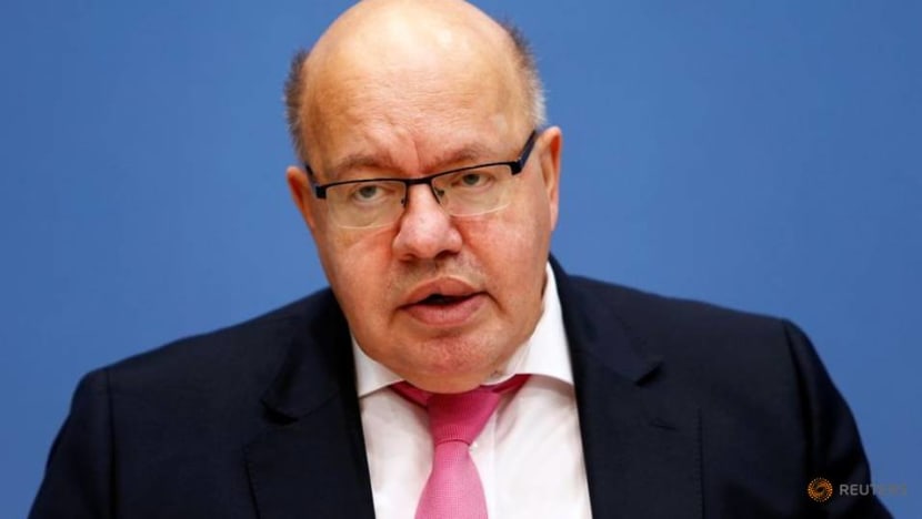 EU 'regrettably' hits US with tariffs, seeks better Biden ties EU 'regrettably' hits US with tariffs, seeks better Biden ties