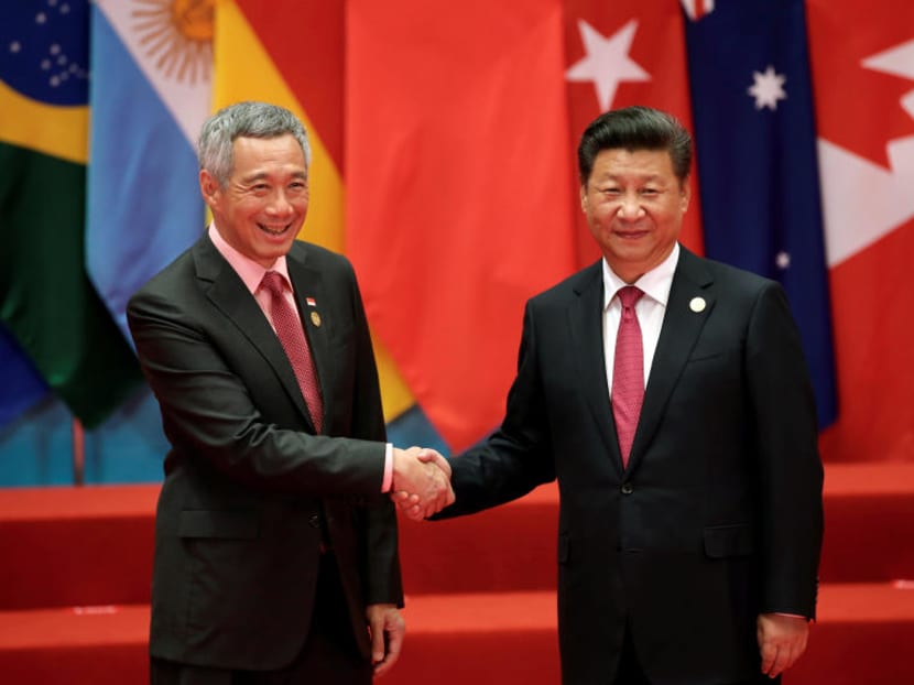 Prime Minister Lee Hsien Loong shaking hands with Chinese President Xi Jinping during the G20 Summit in Hangzhou earlier in September. Photo: Reuters