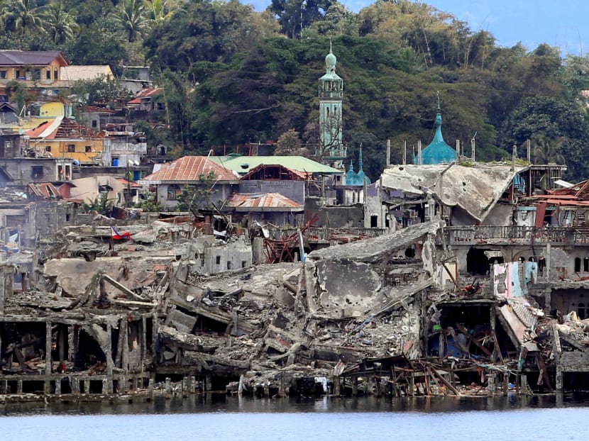 Damaged buildings seen inside a war-torn area in Marawi City, southern Philippines. Philippine President Rodrigo Duterte asks Congress to extend martial law across the southern third of the country until the end of next year to combat Islamist militants and communists. Photo: Reuters