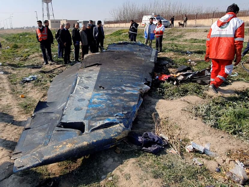 A general view of the debris of the Ukraine International Airlines plane that was shot down by Iran's military over the outskirts of Tehran, Iran on Jan 8, 2020 is seen in this screen grab obtained from a social media video.