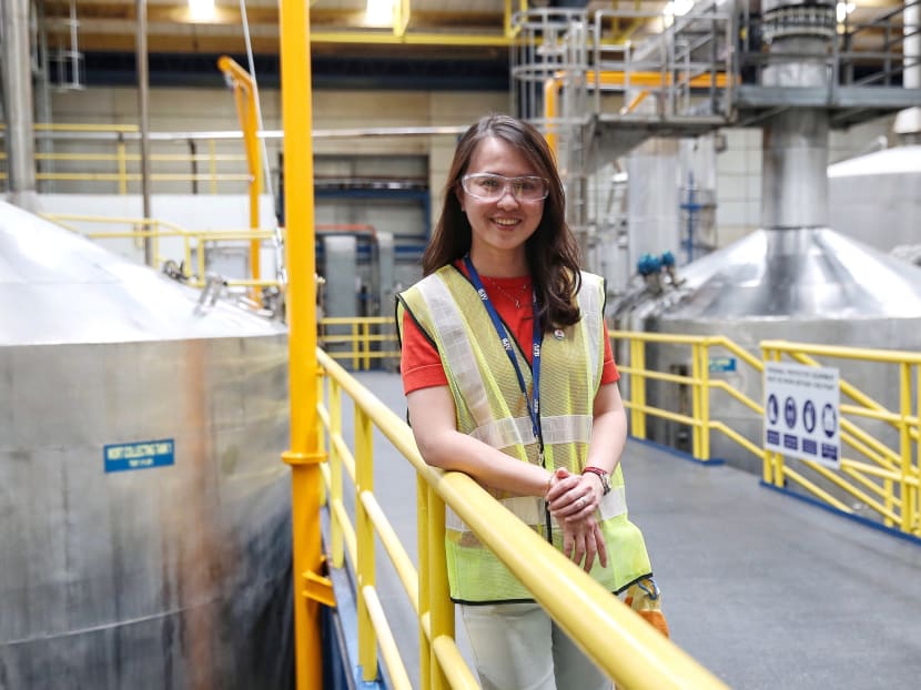Asia Pacific Breweries Singapore brewing manager Lim Yee Fong oversees the work of a 27-strong production team, inspecting tanks and tasting beers to make sure that standards are met.