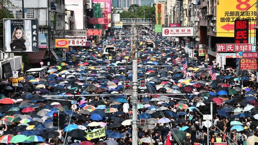 Hong Kongers defy police ban and gather for 'anti-triad' rally