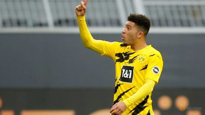 Soccer-Man United complete Sancho signing from Dortmund