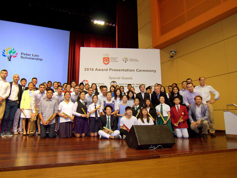 Student-athletes at the scholarship presentation ceremony yesterday. The SOF-Peter Lim Scholarship has disbursed close to S$5 million for 1,758 scholarships since 2010. Photo: Singapore Olympic Foundation