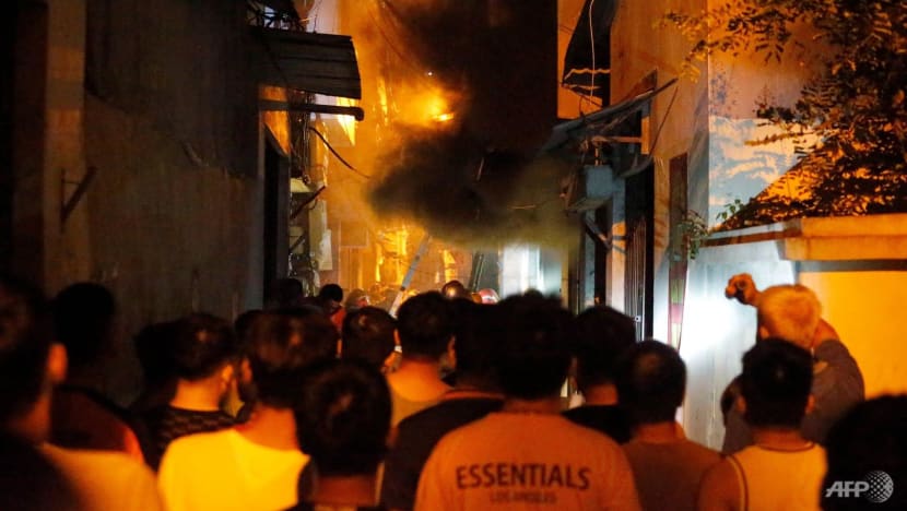 Fire at Vietnam apartment block kills 56, dozens injured