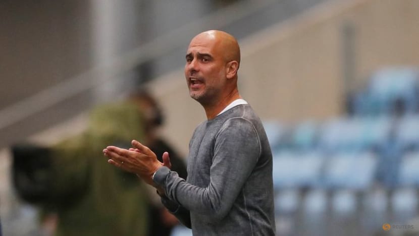 Soccer-Guardiola defends Man City's big spending in transfer market Soccer-Guardiola defends Man City's big spending in transfer market