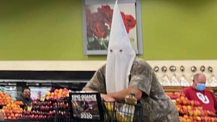 US shopper uses KKK hood as COVID-19 face covering US shopper uses KKK hood as COVID-19 face covering
