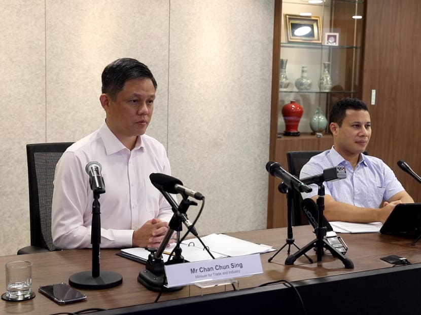 Trade and Industry Minister Chan Chun Sing (left) and National Development Minister Desmond Lee at a press conference on Feb 22, 2021.