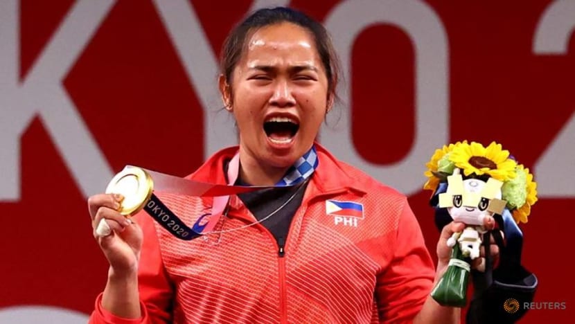 Olympics-weighlifting-From "plot" to pride for Philippines' first Olympic champion Olympics-weighlifting-From "plot" to pride for Philippines' first Olympic champion