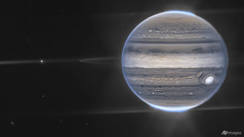 New space telescope shows Jupiter's auroras, tiny moons New space telescope shows Jupiter's auroras, tiny moons