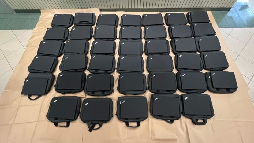 Man charged with stealing 112 laptops from National Cancer Centre Singapore Man charged with stealing 112 laptops from National Cancer Centre Singapore