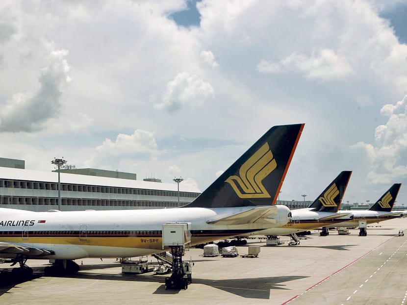 Singapore Airlines planes in the loading bay at Changi Airport. TODAY file photo.