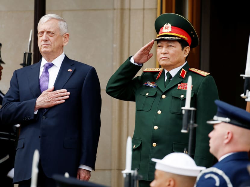 US Defence Secretary Jim Mattis hosting a guard of honour for Vietnamese Defence Minister General Ngo Xuan Lich at the Pentagon earlier this month. Gen Lich announced during the visit that, for the first time in bilateral history, Vietnam had accepted a proposal for a port visit by a US aircraft carrier. Photo: Reuters