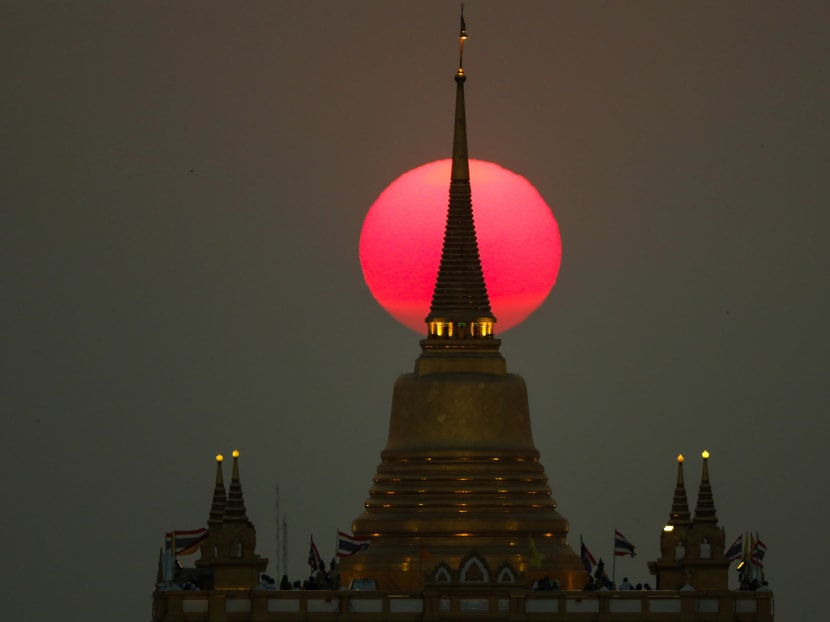 Photo of the day: The sun sets behind Wat Saket Temple, also known as Golden Mount, in Bangkok, Thailand, March 11, 2019.