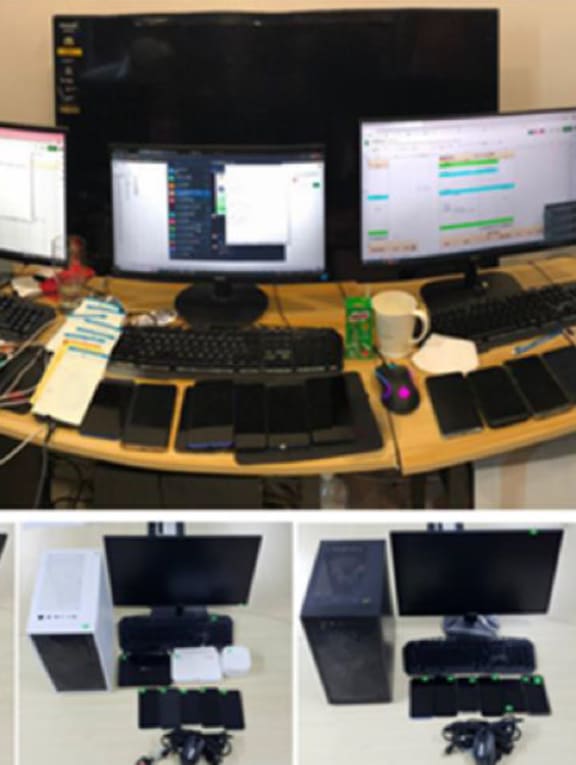 Computers that were seized as case exhibits during the joint operation by the Commercial Affairs Department and Malaysia's Commercial Crime Investigation Department. 