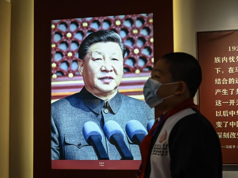 An image of China's President Xi Jinping is seen at an exhibition about the history of the Communist Party of China, at Peking University, Beijing, on Oct 7, 2022.