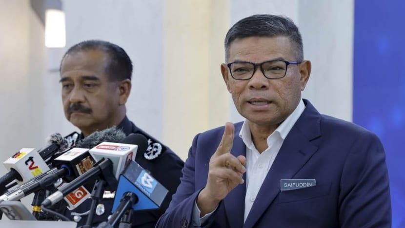 malaysias home minister saifuddin nasution ismail