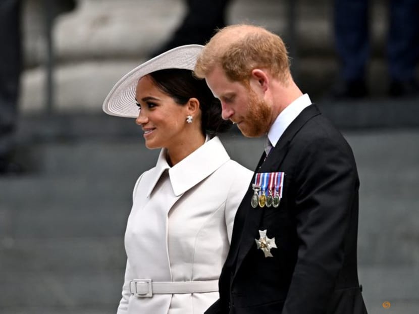 Crowds cheer (and jeer) as Prince Harry and Meghan return to UK 