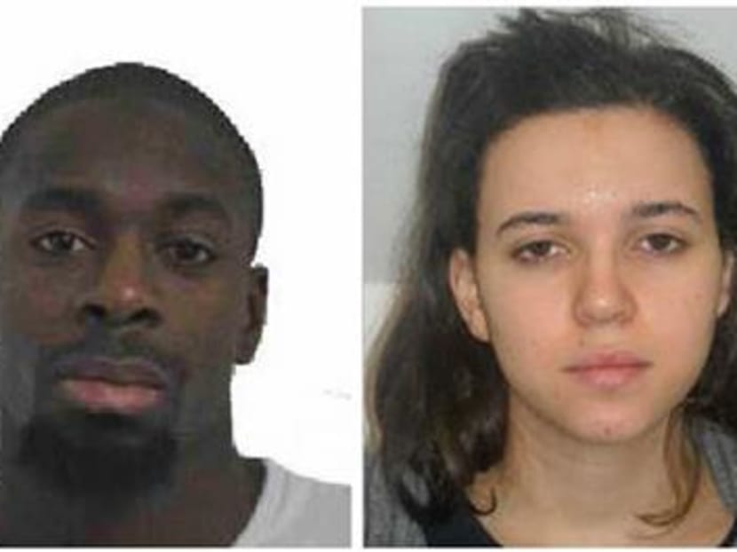 Amedy Coulibaly (left) and Hayat Boumddiene, two suspects named by police as accomplices in a kosher market attack on the eastern edges of Paris on Jan 9, 2015. Photo: AP/Prefecture de Police de Paris