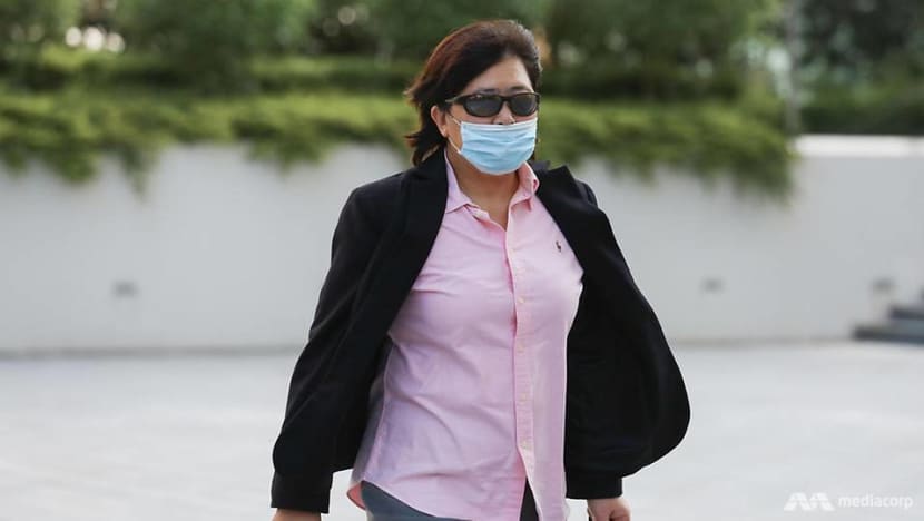 Woman seen without a mask asks again for charges to be dropped, citing 'immunity' as a citizen and as an ex-SAF officer