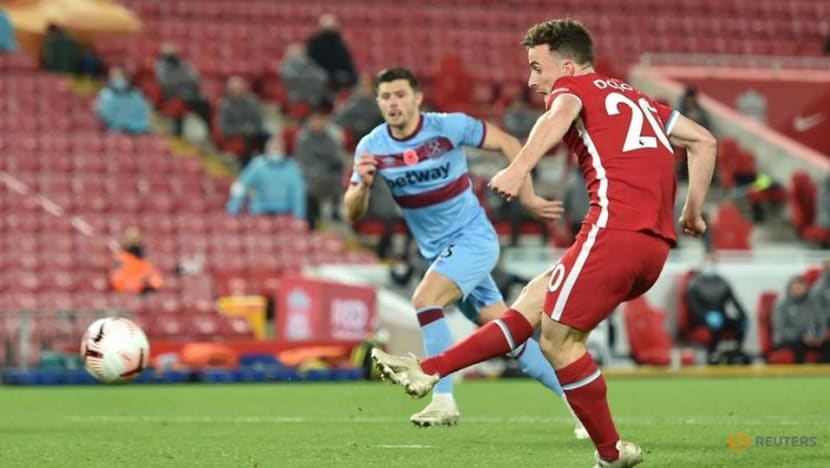 Football: Jota strikes again as Liverpool go top Football: Jota strikes again as Liverpool go top