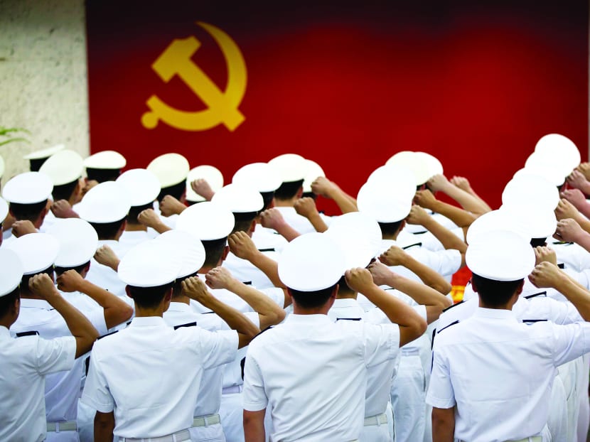 Chinese soldiers at a ceremony in Shanghai. The RIMPAC drills offered China and the US a non-confrontational opportunity to learn more about each other’s capabilities. Photo: REUTERS
