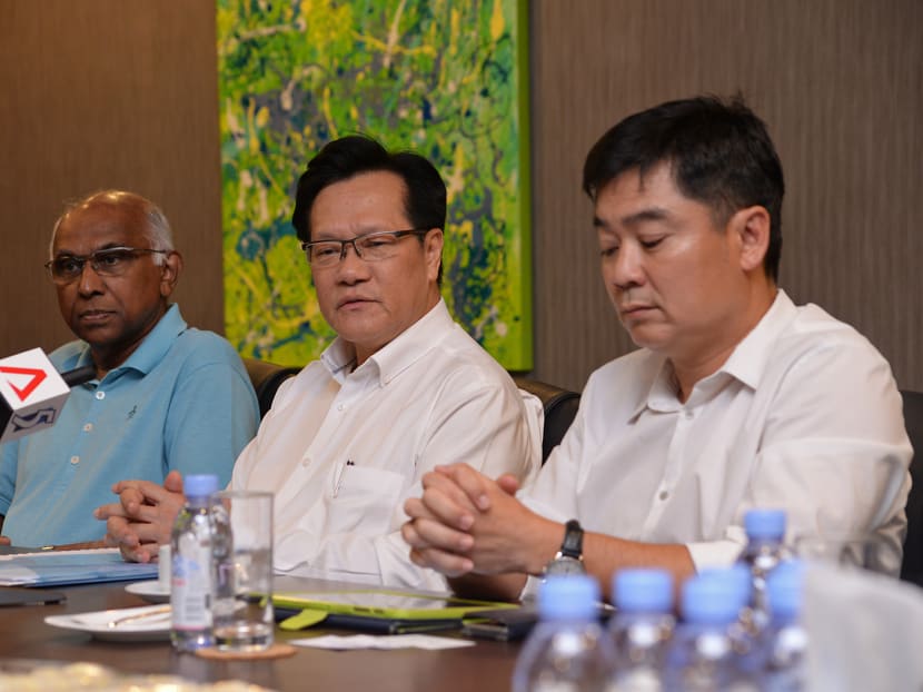 L-R: S Thavaneson, former FAS council member and Balestier Khalsa Football Club chairman, Lim Kia Tong, president-elect of Team LKT and former FAS vice-president, and Bernard Tan, deputy president-elect of Team LKT and former FAS vice-president, at press conference on April 24, 2017. Photo: Robin Choo/TODAY