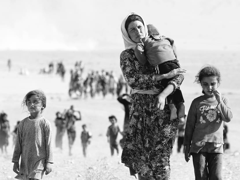 Germany has decided to provide humanitarian assistance to the people fleeing from the Islamic State, including those from the minority Yazidi sect in Sinjar. Photo: Reuters