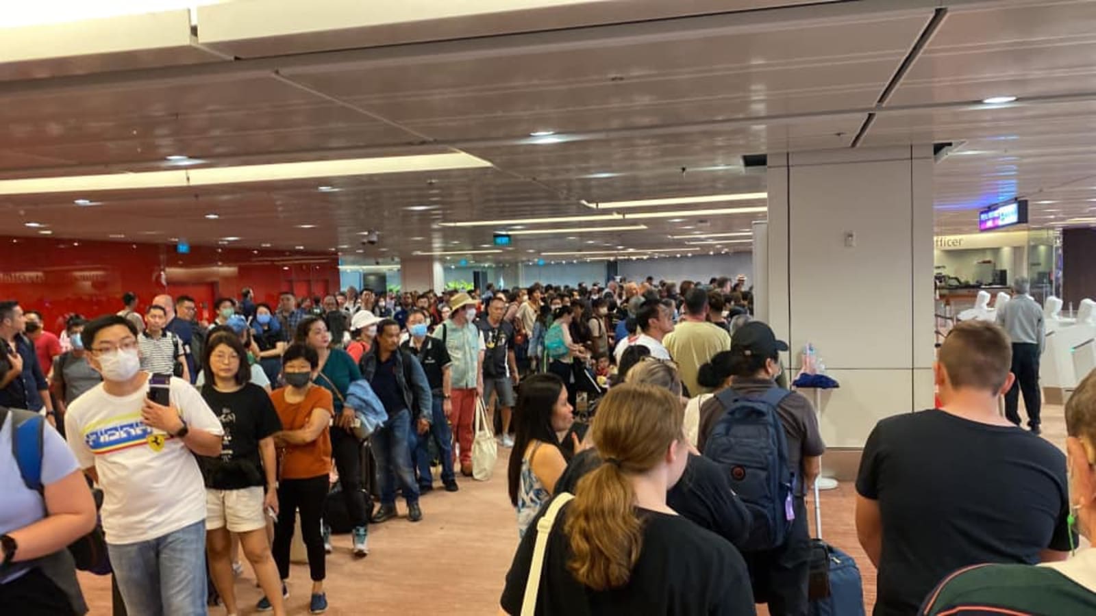 Immigration checkpoint delays caused by 'technical glitch' during system upgrade: ICA