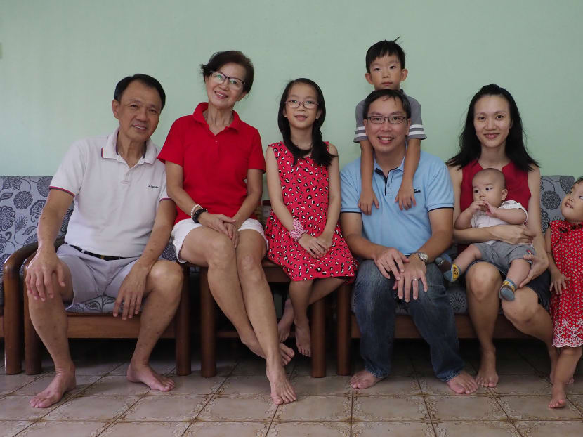 Madam Yap Nyuk Yin (second from left) and her husband, Mr Khoo Wee Nam (extreme left), both retirees, said that the Medisave top-ups and the enhanced Chas subsidies will help ease some of their healthcare costs in the future.