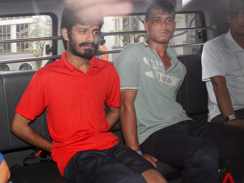 Two of the three more Indian nationals who were charged with rioting being brought to court on Dec 11, 2013. Photo: Channel NewsAsia