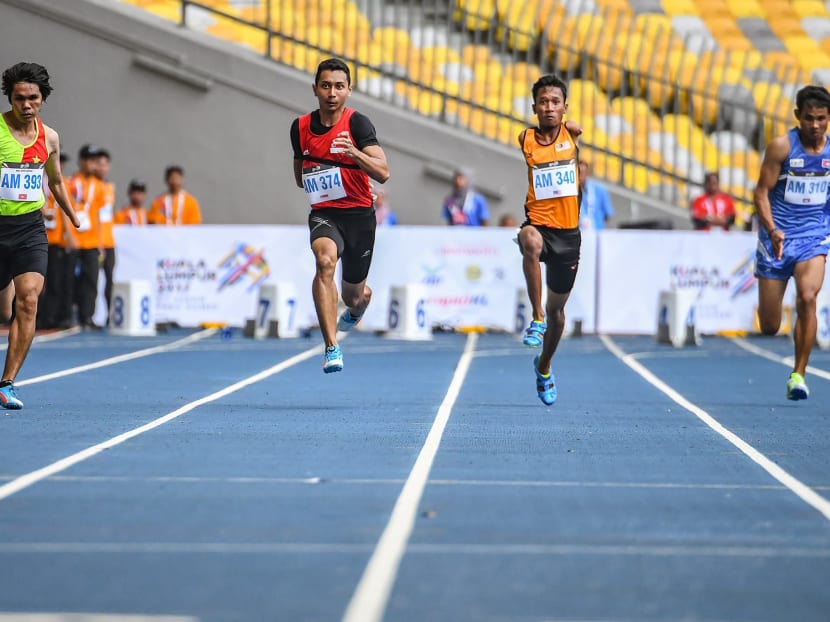 National para sprinter Mohammad Khairi Ishak (photo, second from left) will miss out on the Commonwealth Games after testing positive for a banned substance. Photo: Andrew JK Tan / SportSG
