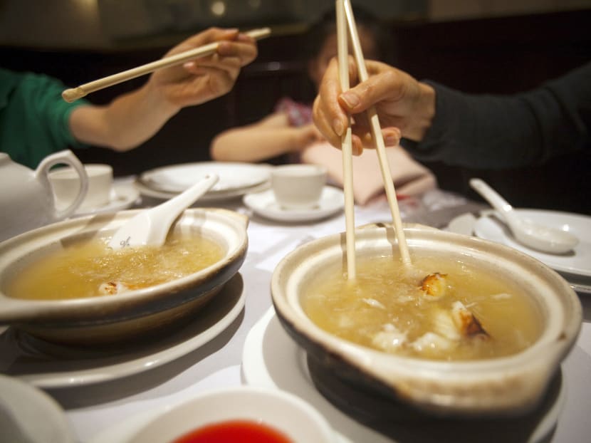 A family eats shark fin soup at Vancouver's Grand Honor Chinese restaurant in Vancouver, British Columbia, July 1, 2012. Photo: Reuters
