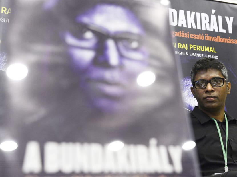 Wilson Raj Perumal, a Singaporean match-fixer who now lives in Hungary, presenting the local edition of his book, Kelong Kings, in Budapest.  Photo: AP