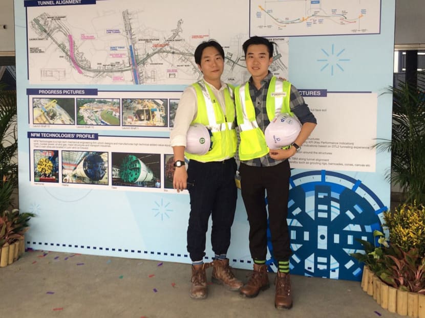 Blogger Nethaniel Foo (right), with a member of the Daewoo Engineering and Construction staff  at the launch of the tunnel-boring machine at Stevens Station along the Thomson-East Coast Line last Saturday. Photo: Nethaniel Foo