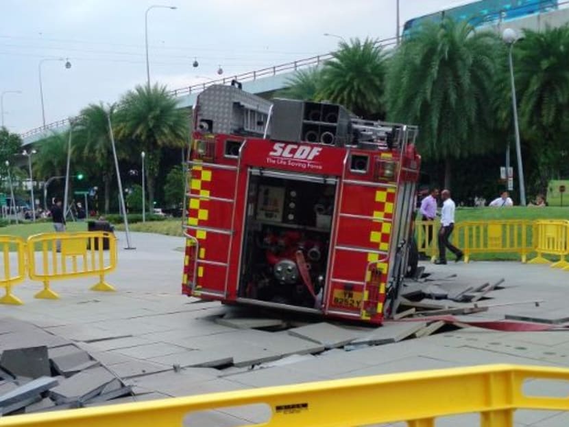 An SCDF fire engine dislodged several tiles outside VivoCity mall today evening (Jan 19). Photo: Channel NewsAsia
