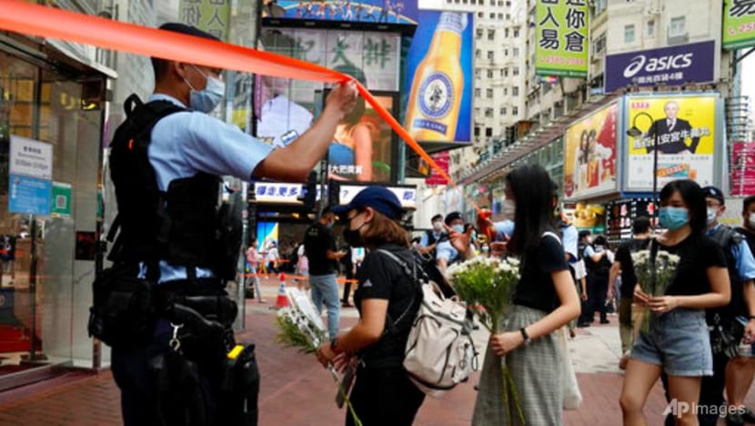 Hong Kong police warn residents against mourning man who stabbed police officer Hong Kong police warn residents against mourning man who stabbed police officer