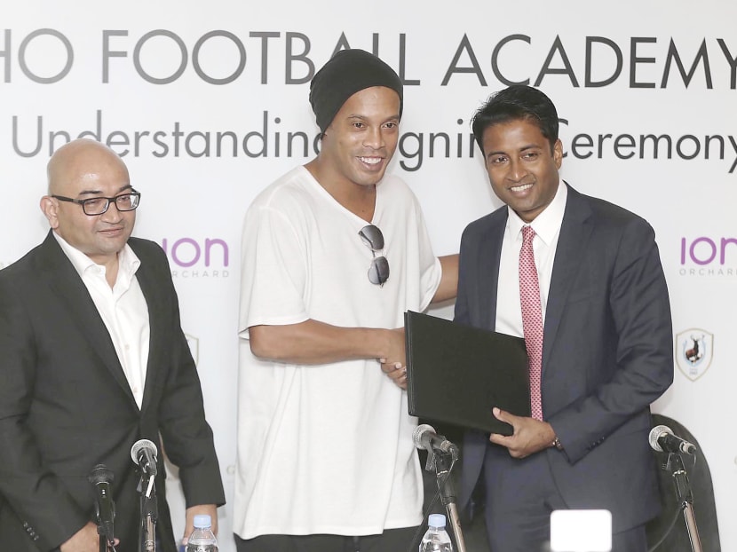 Tampines Rovers chairman Krishna Ramachandra (right) tried to set up a football academy with Brazilian football star Ronaldinho as a source of income for the club but the venture ultimately did not take off. TODAY FILE PHOTO