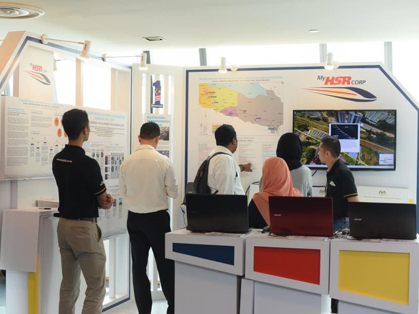 People viewing the plans for the Kuala Lumpur-Singapore High Speed Rail in Malaysia. Singapore and its closest neighbour aborted the project on Jan 1, 2021.