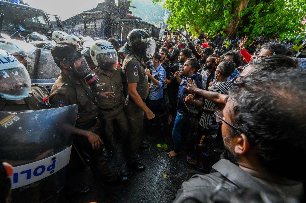 University students speak with police during a demonstration demanding the resignation of Sri Lanka's President Gotabaya Rajapaksa over the country's crippling economic crisis, in Colombo on May 19, 2022. University students speak with police during a demonstration demanding the resignation of Sri Lanka's President Gotabaya Rajapaksa over the country's crippling economic crisis, in Colombo on May 19, 2022.