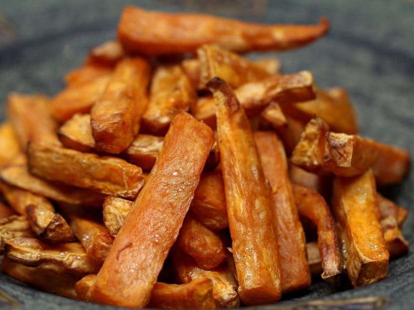 Sweet potato fries are the healthier alternative to regular fries. Photo: ELLE.sg