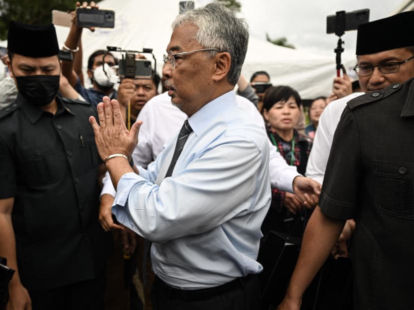 Malaysia's King Sultan Abdullah Sultan Ahmad Shah gestures as he meets members of the media outside the National Palace in Kuala Lumpur on Nov 21, 2022.
