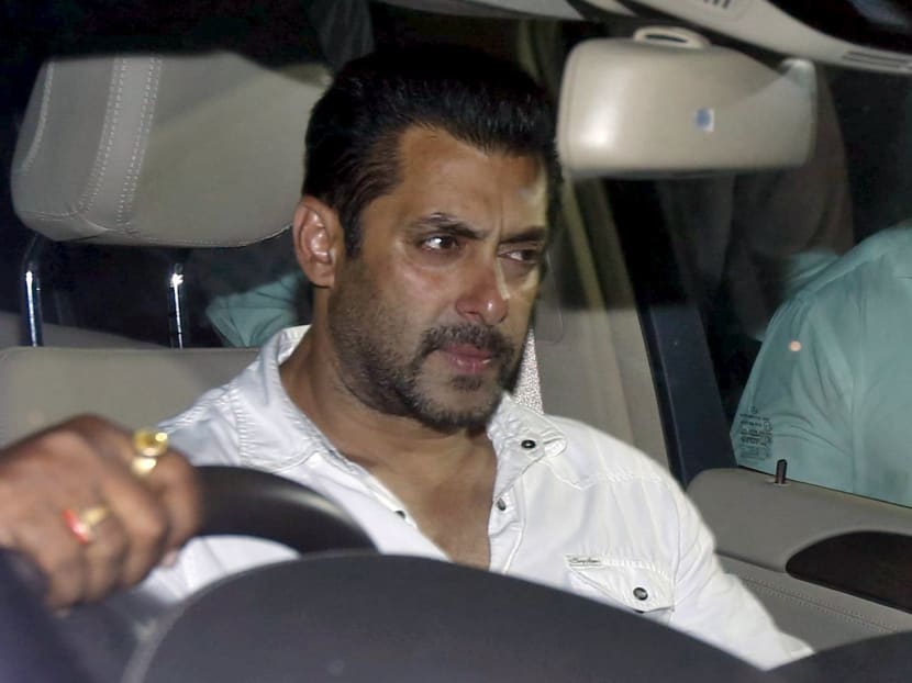 Bollywood actor Salman Khan sits in a car as he leaves a court in Mumbai, India, May 6, 2015. Photo: Reuters