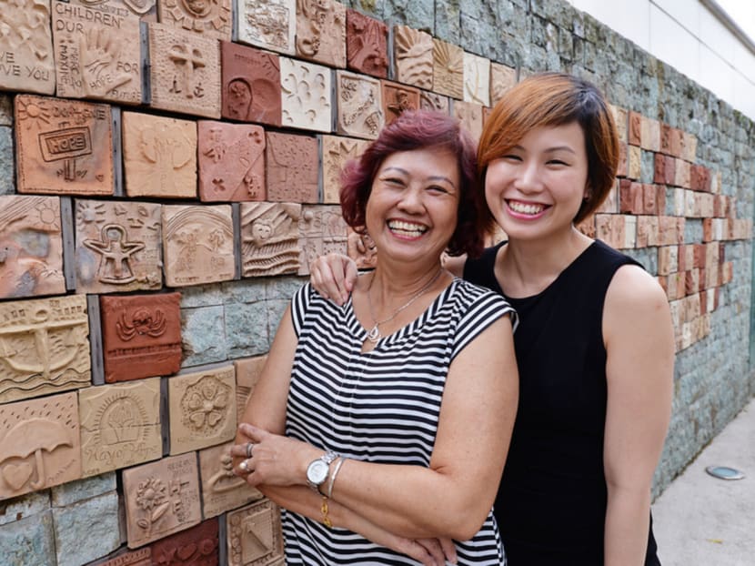 Mdm Sng Jek Choo (left), 61, with her daughter Ms Ooi Sue Anne. Mdm Sng, whose cancer is ‘stable’ but not totally eradicated, continues to live a fulfilling life, engaging in her favourite activities such as dancing, tai chi and travelling. PHOTO: ROBIN CHOO
