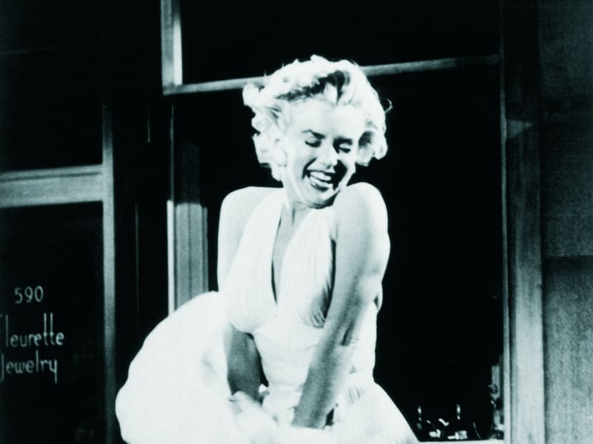 Marilyn Monroe in the iconic white dress.