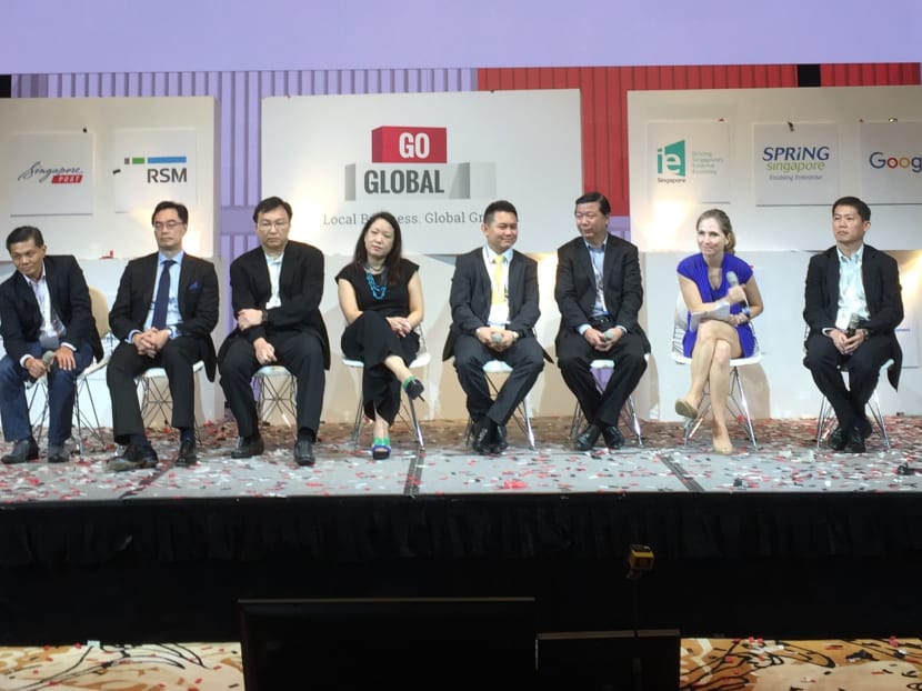 From left to right: Mr Ang Ser-Keng, Director of UOB-SMU Asian Enterprise Institute, Mr Mervyn Koh, Head of Business Banking, Singapore, United Overseas Bank, Mr Michael Lam, Head of Singapore Ecosystem and SME, Singapore Post, Ms Teresa Wong, Head of Marketing Asia Pacific, CyberSource, Mr Nicholas Goh, CEO, Verztec Consulting Pte Ltd, Mr Patrick Ang, Deputy Managing Partner and Head, Regional Practices, Rajah & Tann Singapore, Ms Joanna Flint, Country Director, Google, Singapore, Mr Paul Lee, Managing Partner, RSM. Photo: Hardasmalani Rumi
