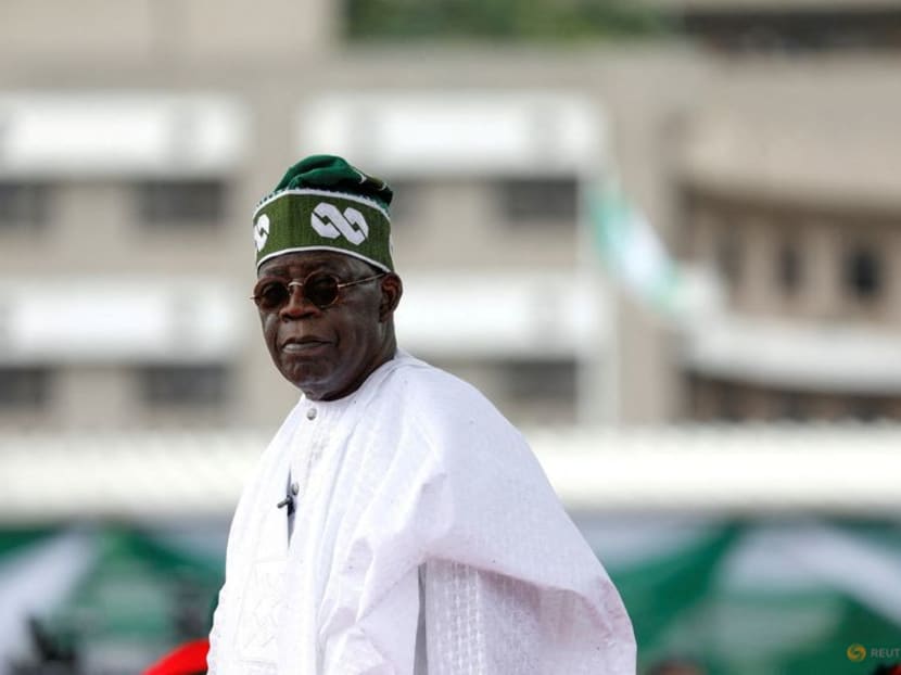 FILE PHOTO: Nigeria's President Bola Tinubu looks on after his swearing-in ceremony in Abuja, Nigeria May 29, 2023. REUTERS/Temilade Adelaja/File Photo