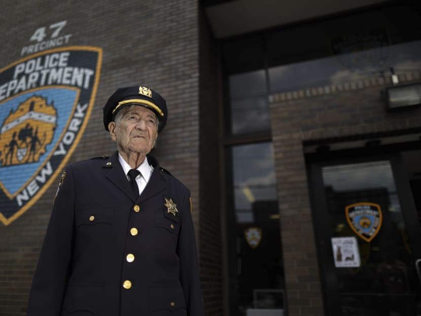 Gene Fastook, a police auxiliary captain in the Bronx, who is the department’s second-oldest person, in New York, July 12, 2017. Fastook, who helped make it possible for humans to walk on the moon and return to Earth to tell the tale, is still on the go with the police auxiliary in the Bronx. Photo: The New York Times